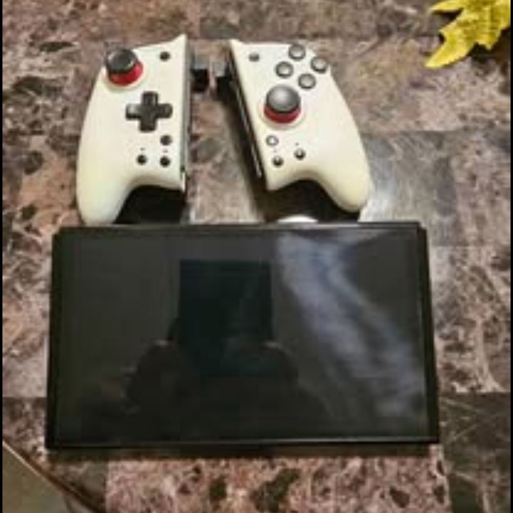 Nintendo Handheld Console with White Controllers - Picture 3 of 3
